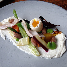 Ham fat with fresh vegetables, balsamic and a soft boiled quails egg